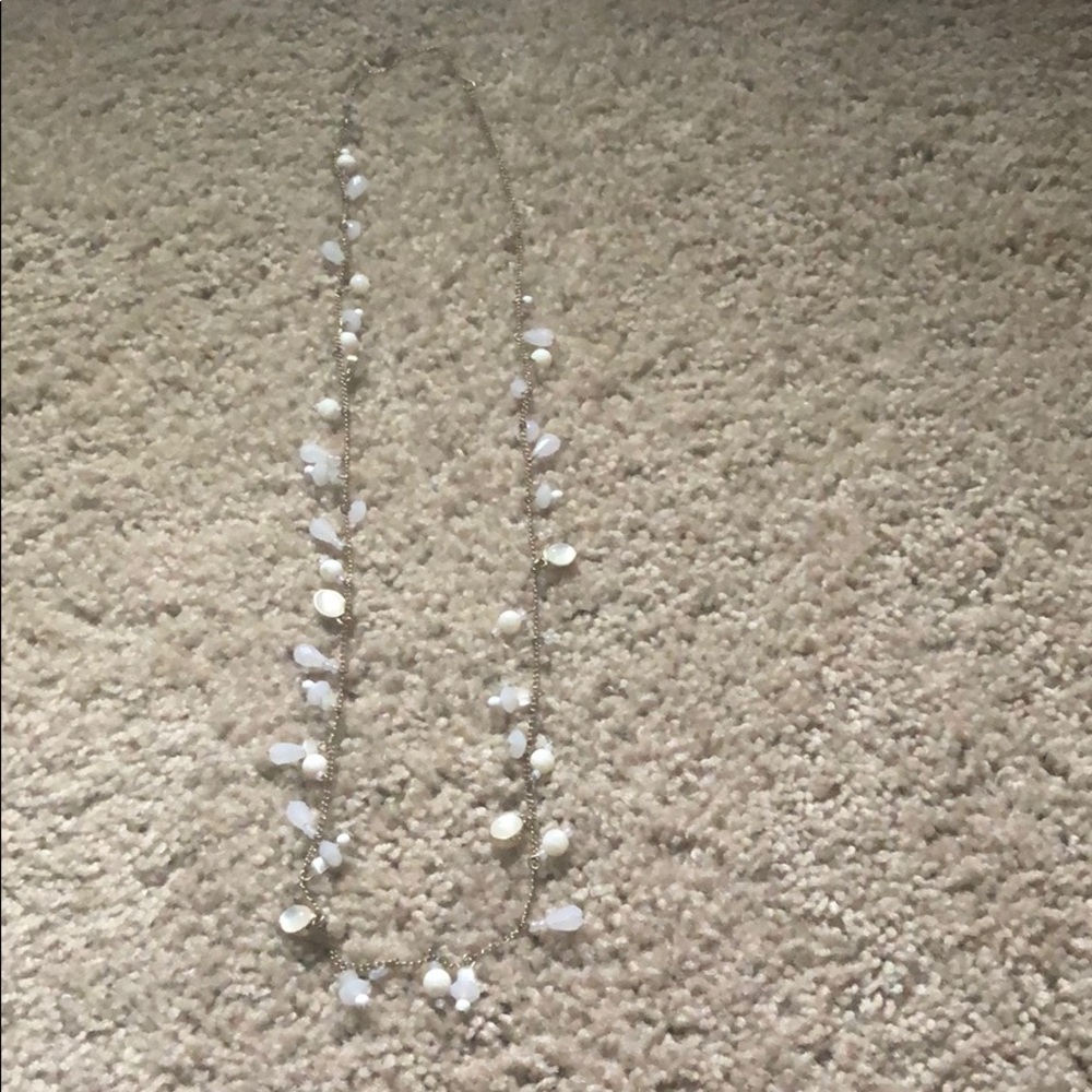 White ans gold needed necklace